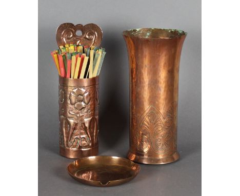 Three copper items, all thought to be KSIA, comprising - cylindrical wall pocket or taper stick holder, embossed with flowers