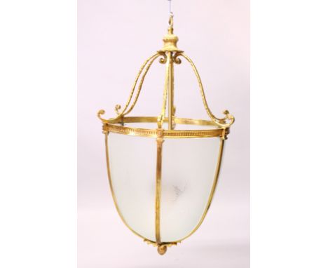 A LARGE BRASS AND FROSTED GLASS HALL LANTERN. 92cms high.