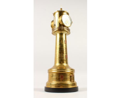 A VERY GOOD EARLY 20TH CENTURY BRASS LIGHTHOUSE, with clock, barometer and two thermometers. 44cms high.