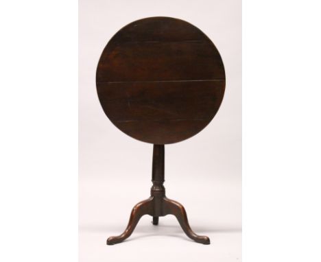 A GEORGE III YEW WOOD TILT TOP TRIPOD TABLE, with a circular top and turned column support. 60cms diameter.