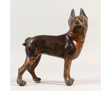 A PAINTED CAST IRON DOOR STOP, modelled as a dog. 22cms.