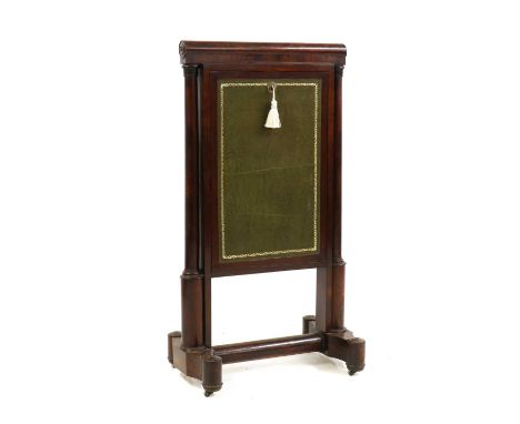 An Empire style folding writing table,with turned supports, and embossed leather front opening to reveal a writing surface, h