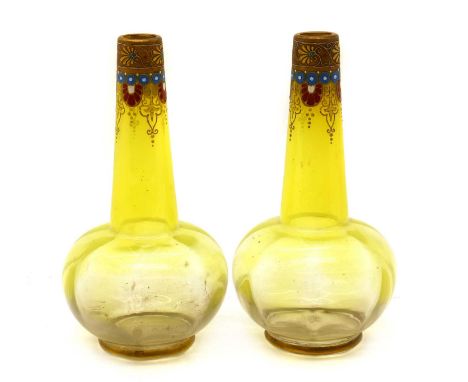 A pair of Ludwig Moser vaseline glass vases,late 19th century, each of bulbous form with a long tapering neck, the neck with 