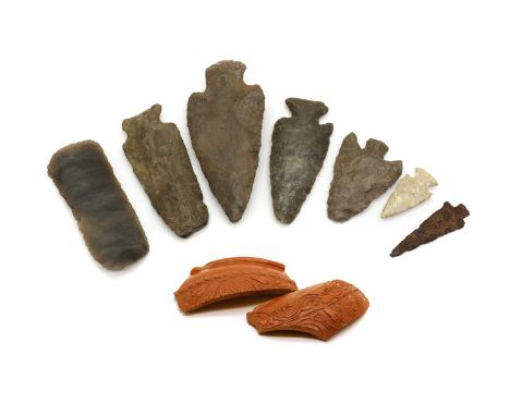 A collection of stone arrow and spear heads,one iron, largest 11cm long, and two shards of pottery (qty)Condition ReportChips