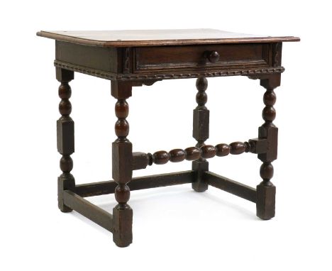 A James II style oak side table,19th century with earlier elements, long drawer, on bobbin turned and joint legs,82cm wide55c