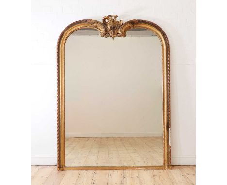 A Louis XV-style giltwood mirror,20th century, the arched top with a shell-shaped cornice, 160 x 190cmCondition ReportWith a 