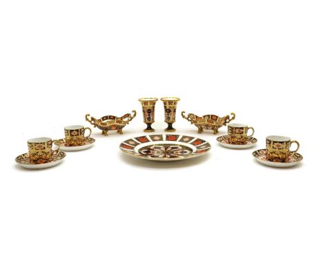 A collection of Royal Crown Derby Imari porcelain tea and dinner wares, comprising a pair of twin-handled dishes, 17cm wide, 