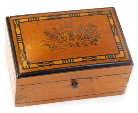 A French wooden souvenir box, inscribed Souvenir de Fontainebleau, with hinged side panel, 5cm high, 9.5cm wide, 6cm deep. 