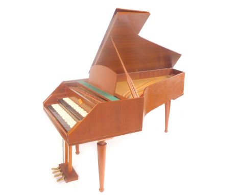 A 1960s William de Blaise teak cased harpsichord, with rosewood and white plastic keys, with tuning key, brochure, and mainte