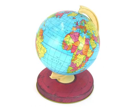 An early 20thC Chad Valley tin plate child's terrestrial globe, 20cm high. 