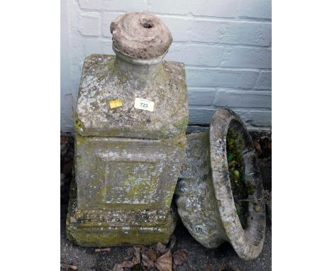 A reconstituted stone garden planter, with font bath, on a square set tapered base, 80cm high. (AF) 