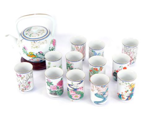 A Franklin porcelain collection Oriental beaker set, comprising eleven beakers and associated teapot on stand, with five boxe