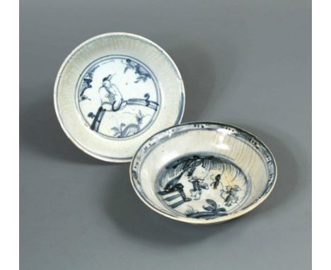 Two Ming dynasty dishes with figures, the first painted with a seated sage roundel, the exterior with scrolling lotus band, c
