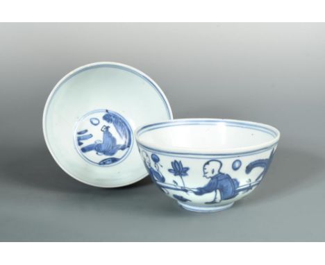 A pair of Ming blue and white bowls, painted in the centre with a seated sage watching the moon, the exterior with a pair of 