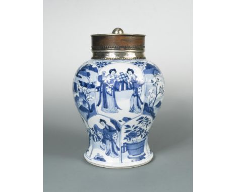 A silver mounted Kangxi baluster jar with wood cover, painted with alternating panels of figures, islands and flowers, 23cm h
