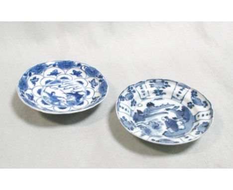 Two small dishes late Ming and Kangxi, the late Ming dish with lappets radiating around a sage seated on an island, 11cm diam