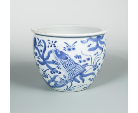 An 18th century Chinese blue and white planter, the exterior painted with four fish amongst aquatic flora, 22cm diameter  Som