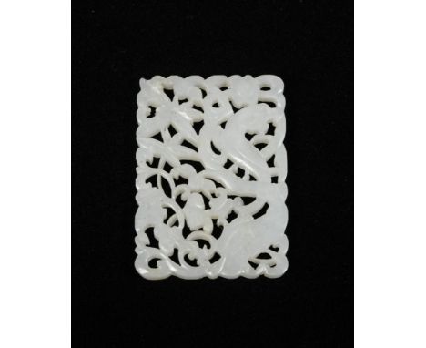 A white jade carved plaque, 19th century or later, the nephrite square plaque with a phoenix on a foliage background, mutton 
