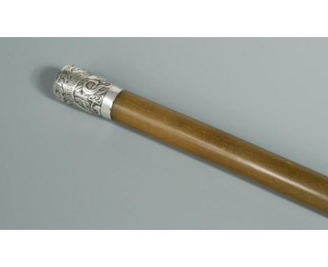A silver topped rhinoceros horn walking stick, marked for Wan Hing (Hong Kong), 90cm long Other Notes: Wang Hing (born in 185