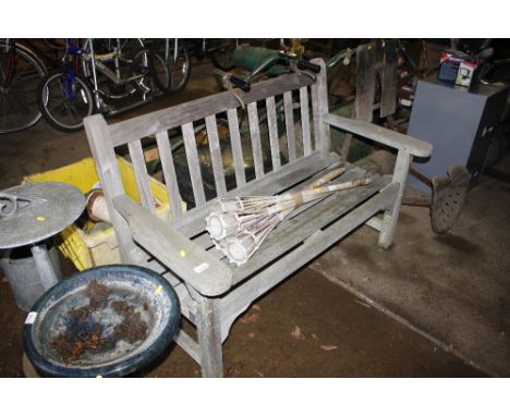 A teak garden bench