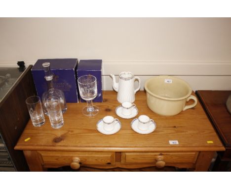 A commemorative Royal wedding Dartington glass decanter and tumblers; a matching rummer; a blue and gilt coffee pot and three