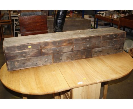 A vintage pine nest of drawers