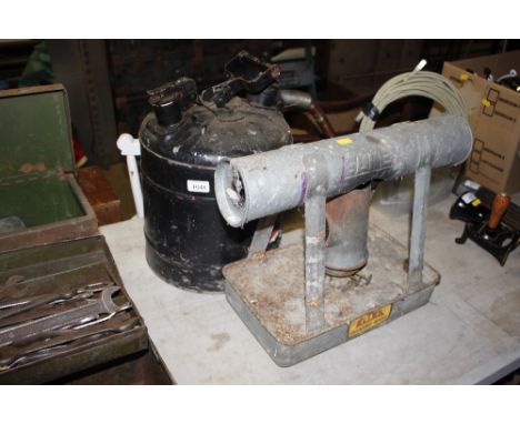 A vintage petrol can; and a greenhouse heater