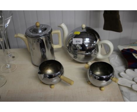 An insulated Art Deco style part teaset and similar teapot 