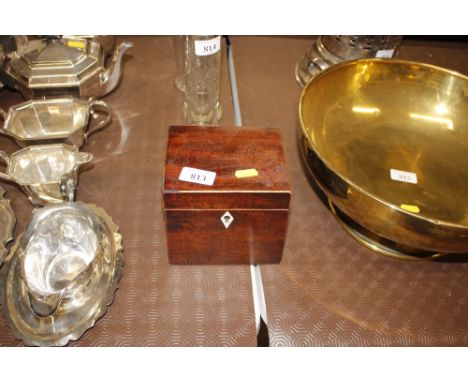 A 19th Century mahogany tea caddy with boxwood stringing and ivory escutcheon, the interior converted