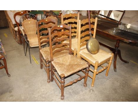 Two pairs of ladder back dining chairs