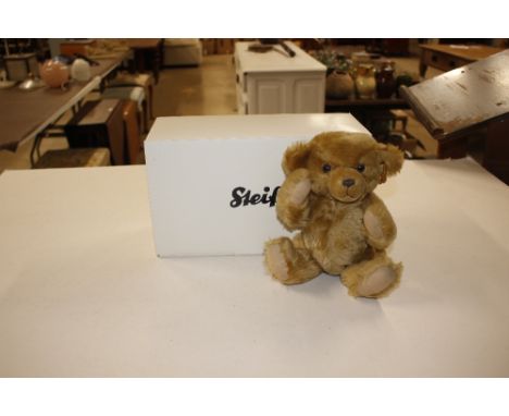 A small Steiff bear, boxed