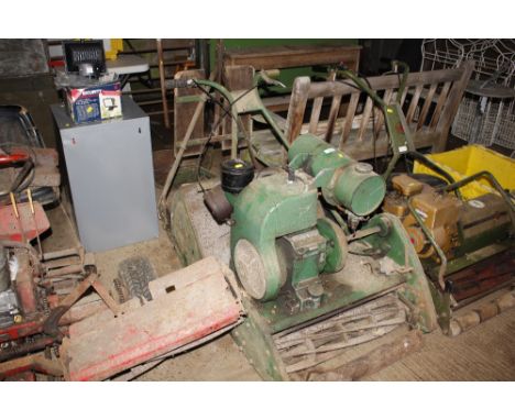 A vintage ride-on JAP model 4/3 cylinder ride-on mower, complete with grass box, seat and roller