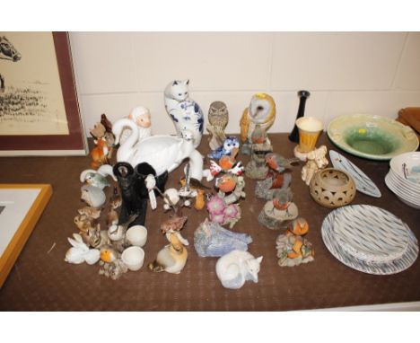A large collection of porcelain and other bird and animal ornaments, including Christopher Holt and Border Fine Art examples