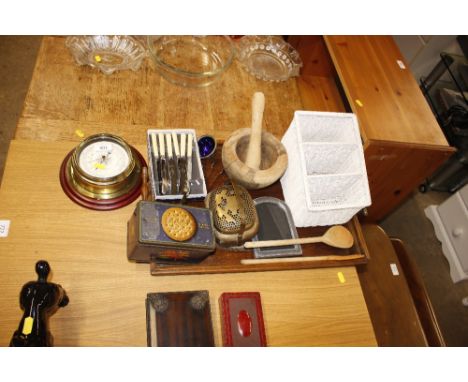 An early 20th Century two handled wooden tray; a brass cased barometer; an oriental brass censor; a vintage biscuit tin; cutl