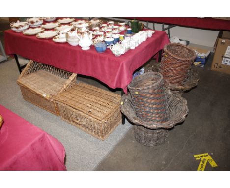 A wicker picnic hamper; a set of cast iron and enamel kitchen scales; a wicker seat with box compartment; and four various wi