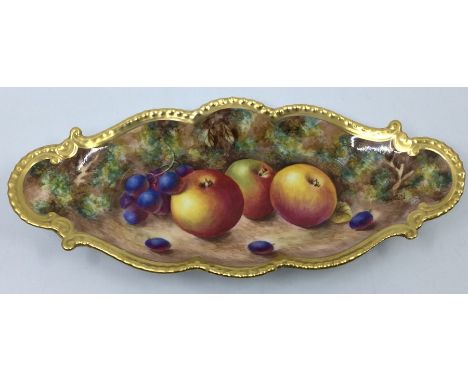 A Royal Worcester painted porcelain lozenge shaped dish, wavy gilt rim, the body painted with peaches, sloes with hedgerow be