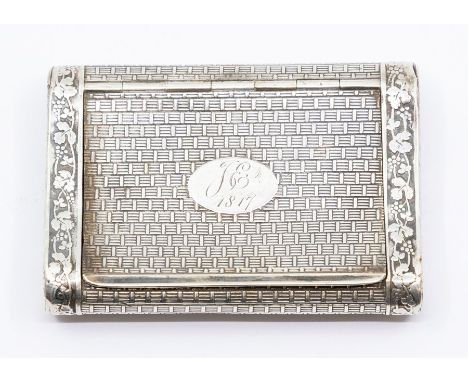 A 19th Century French white metal snuff box, the body engraved with brick work design, the borders with trellis vine leaves a