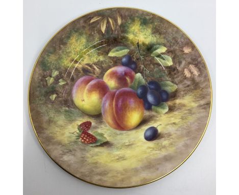 A Royal Worcester painted porcelain plain circular plate, the entire painted with peaches, sloes, rowanberries all within ivy