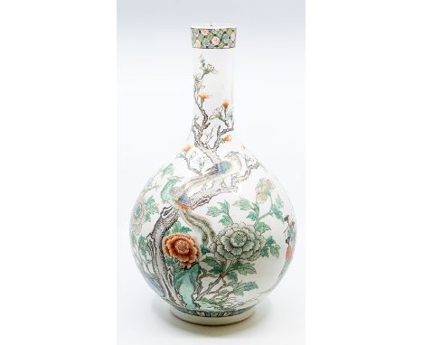 A Chinese famille verte bottle vase, Qing dynasty, 19th century, the rounded body painted with a group of female musicians pl