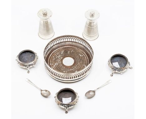 A collection of table silver to include: a set of three Victorian circular salts, floral decoration on three hoof feet, Londo