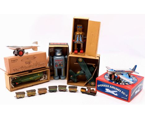 Tinplate novelty group including: robots (sparkling robot has areas of repainting), planes and blimps; mostly modern Chinese 
