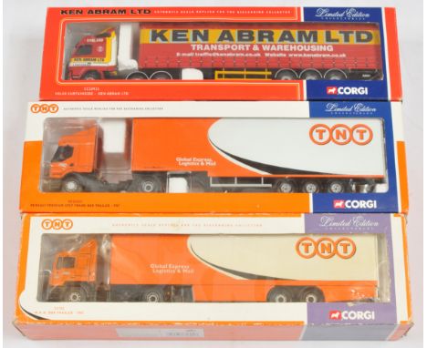 Corgi a boxed trio of 1:50 scale trucks to include, (1) CC12111 "TNT", (2) CC12411 "Ken Abram LTD", (3) #75701 "TNT". Conditi