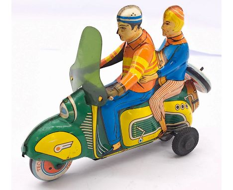 Technofix (Germany) tinplate Scooter/Vespa, friction powered, some surface and age related wear otherwise Good.