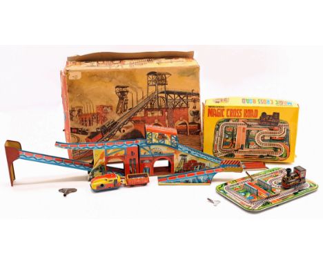 Tinplate train set pair including: (1) Technofix (Germany), set No. 294, clockwork train with track, with key but untested, w