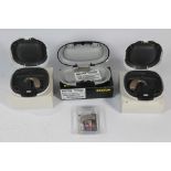 Four Hearing Aids to include Two Oticon Engage Hearing Aids, A Oticon Real 2 Minirite R and A Rexton