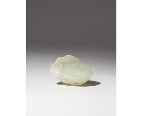 A CHINESE PALE CELADON JADE CARVING OF A LOTUS SEED POD QIANLONG 1736-95 Carved as an insect with long antennae resting on a 