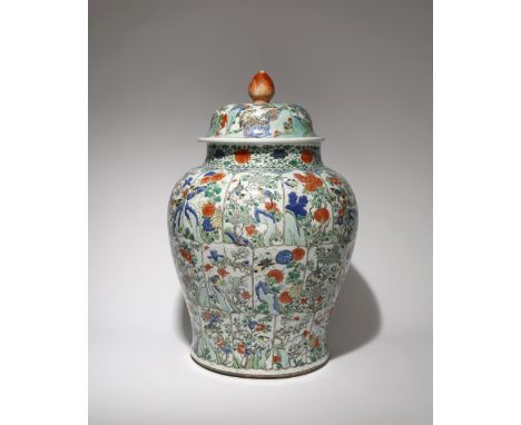 A LARGE CHINESE FAMILLE VERTE 'BIRDS AND FLOWERS' BALUSTER VASE KANGXI 1662-1722 The body painted with three rows of interloc