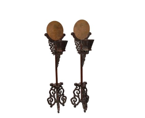 A PAIR OF CHINESE ZITAN AND HARDWOOD HEXAGONAL-SECTION CANDLESTICK HOLDERS ON STANDS 19TH CENTURY The zitan baskets carved wi