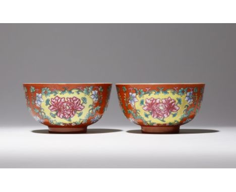 A PAIR OF CHINESE FAMILLE ROSE CORAL-GROUND 'PEONY' BOWLS SIX CHARACTER XUANTONG MARKS AND OF THE PERIOD 1908-11 Each painted