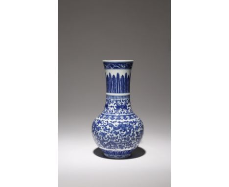 A CHINESE BLUE AND WHITE 'DRAGON' BOTTLE VASE SIX CHARACTER QIANLONG MARK AND PERHAPS OF THE PERIOD Painted to the exterior w
